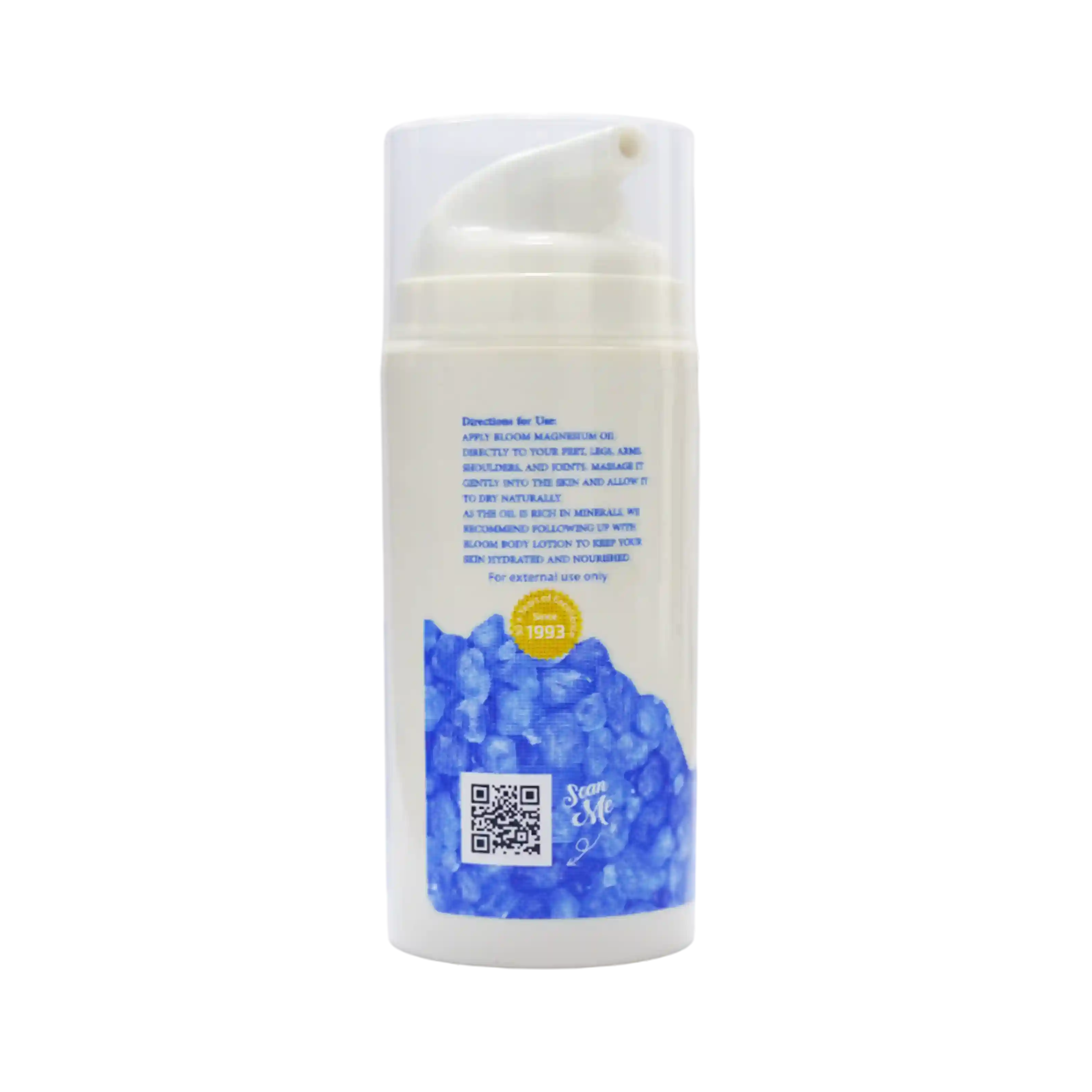 Bloom Dead Sea Life Organic Dead Sea Magnesium Oil on a wooden surface with calming herbs, highlighting its therapeutic properties for stress relief and skin hydration.