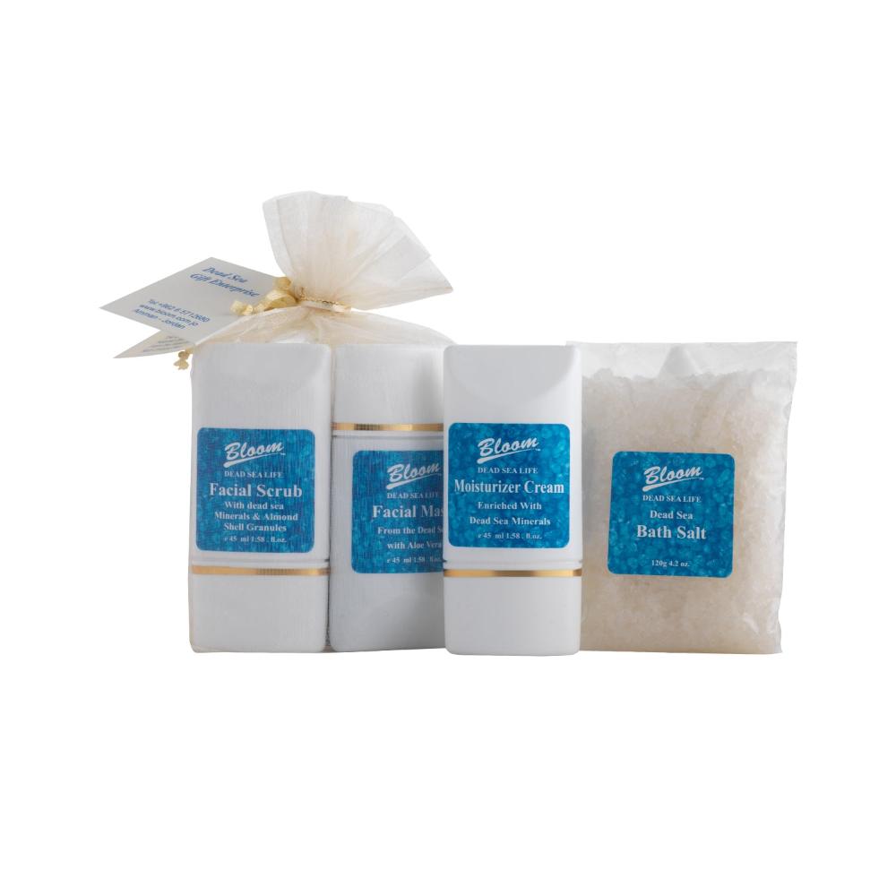 Complete skincare set: Bloom Dead Sea Organza Kit with hydrating mask, nourishing moisturizer, exfoliating scrub, and calming bath salts